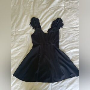 NWT sexy dress with “wings”.